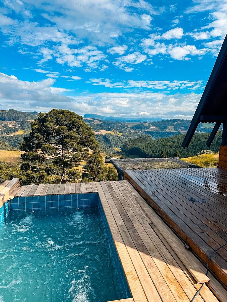 Chalé com piscina aquecida e vista incrivel