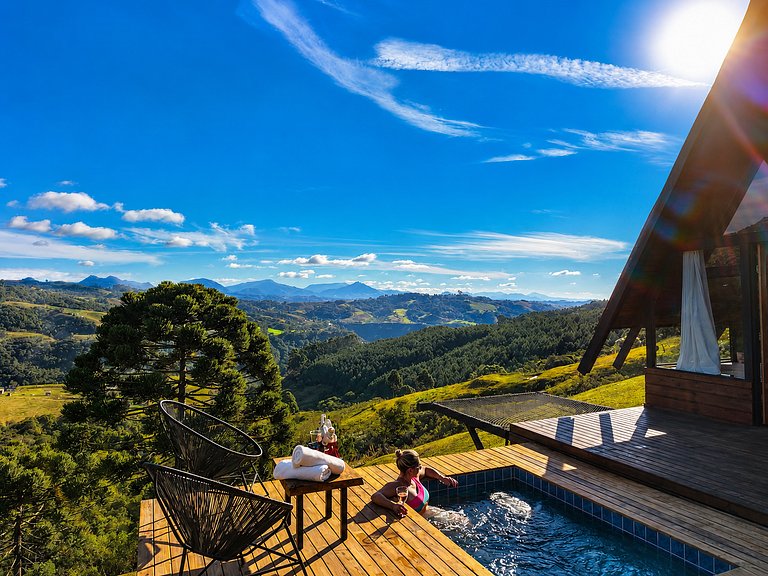 Chalé com piscina aquecida e vista incrivel